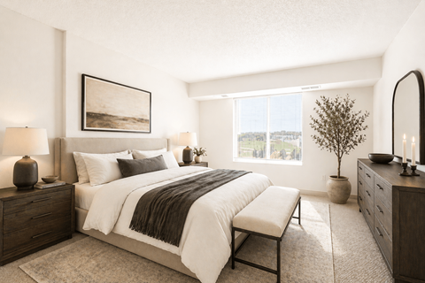 Spacious bedroom with modern furnishings at Lakewood Apartments, Lino Lakes, 55014