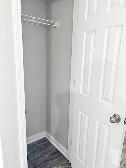 A white door with a silver handle and a white interior.