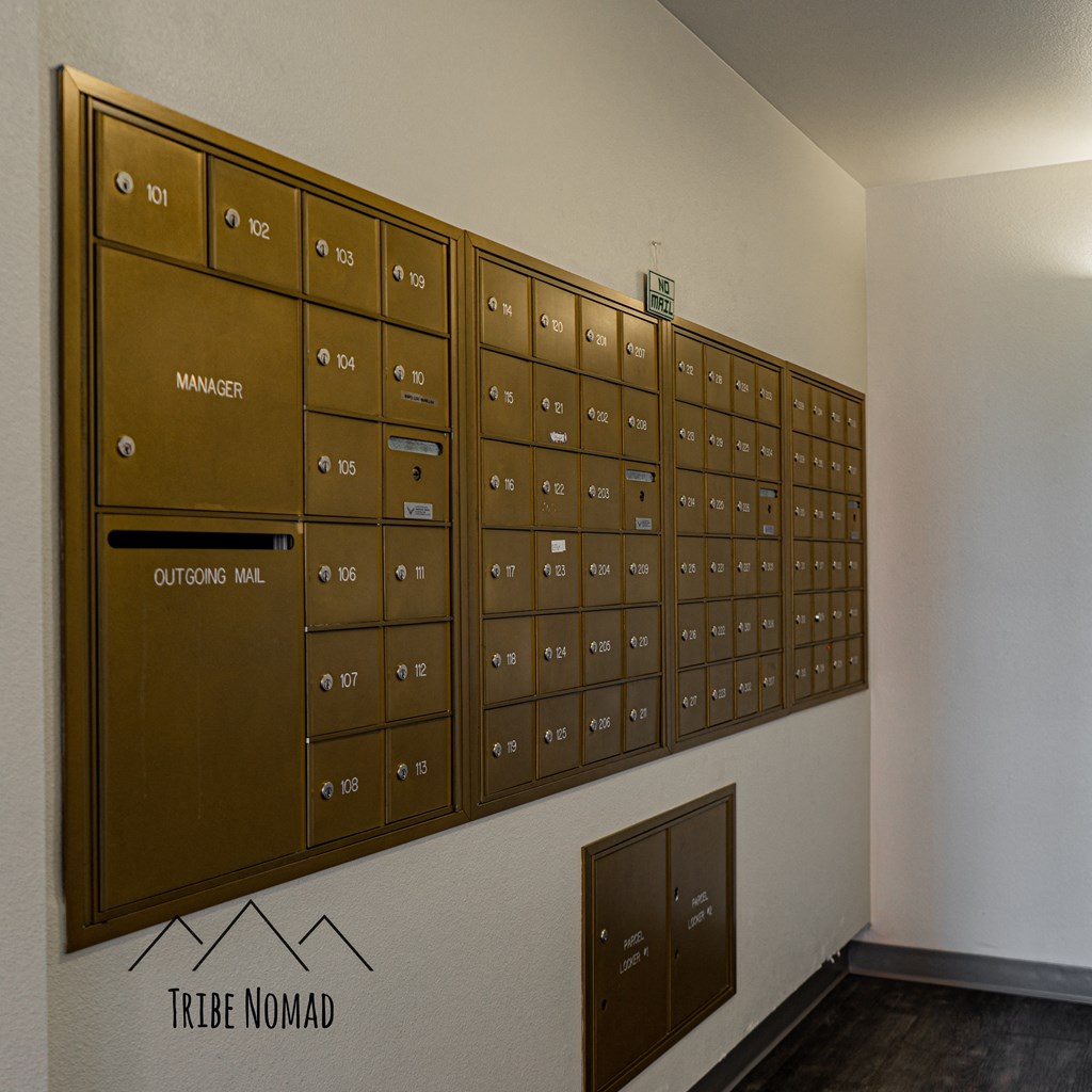 a locker room with a bunch of lockers on the wall