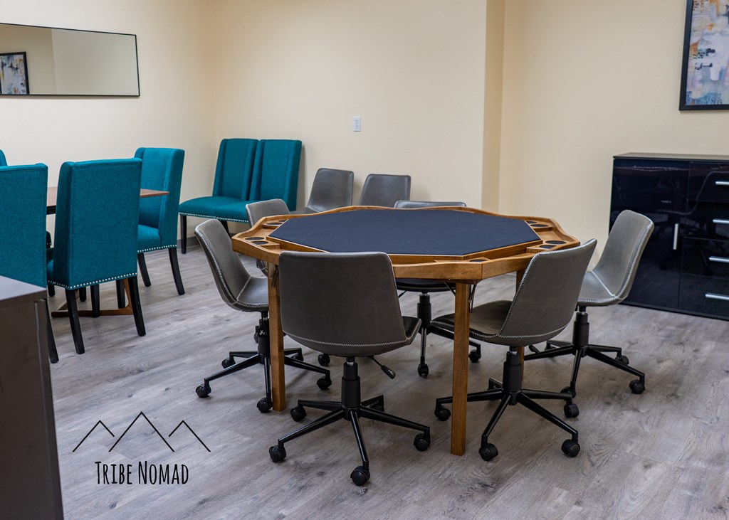 a conference room with a table and chairs