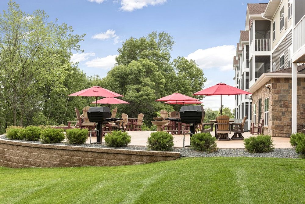 outdoor patio sitting area and grass