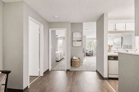 A kitchen area with a dishwasher and a sink.