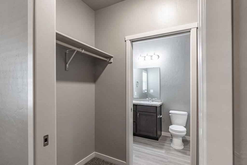 a bathroom with a toilet and a sink