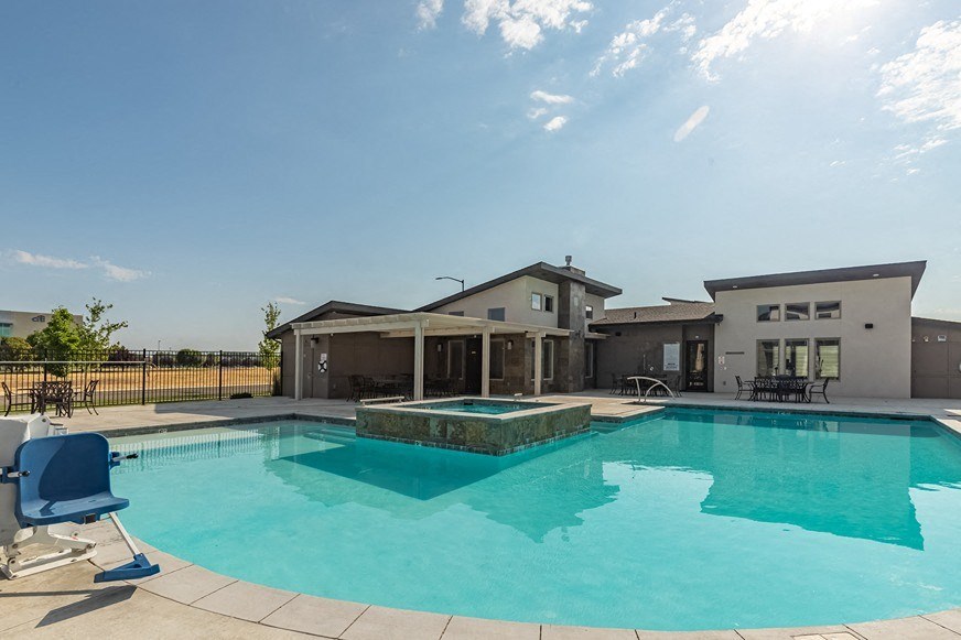 take a dip in the pool at villas at houston levee west apartments in cord