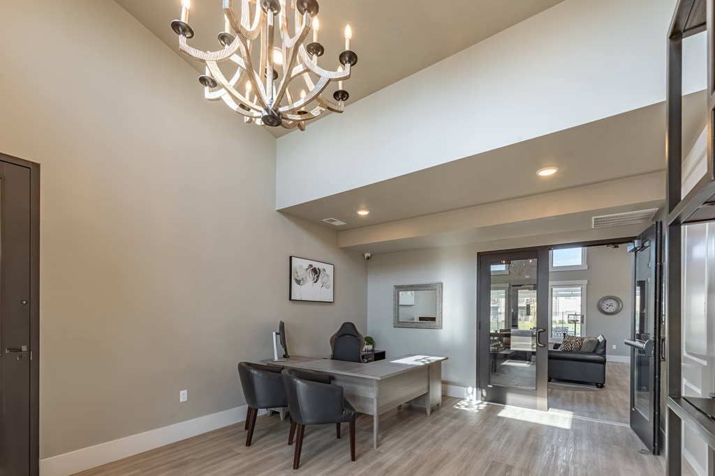 A modern dining room with a large table and chairs. at Harper Ridge Apartments, Meridian, 83642