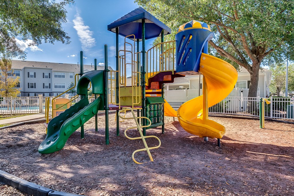 a playground with a slide and other play equipment