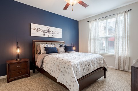 a bedroom with a bed and a ceiling fan at Hurstbourne Estates Apartments, Louisville, KY, 40223