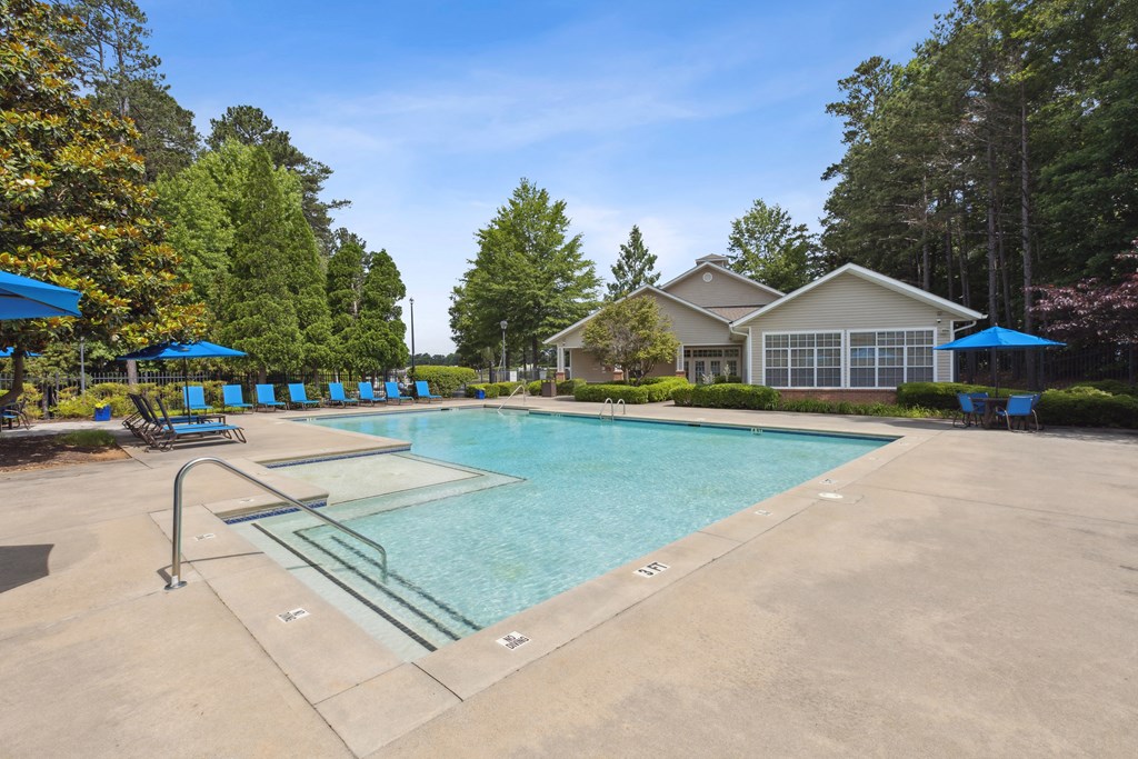 the preserve at ballantyne commons pool with house and trees