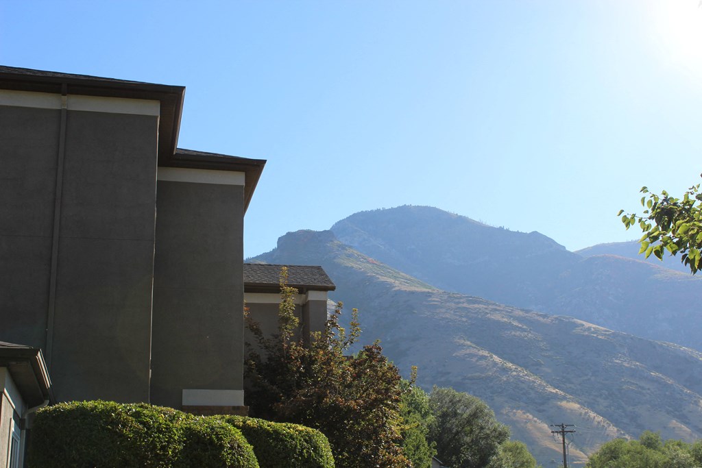 a view of the mountains in the distance from a house