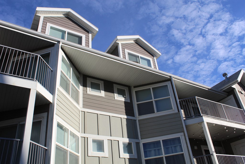 a building with a blue sky in the background