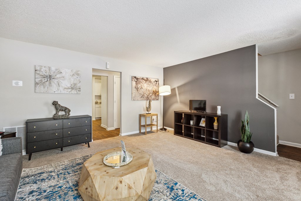 a living room with a couch and a coffee table