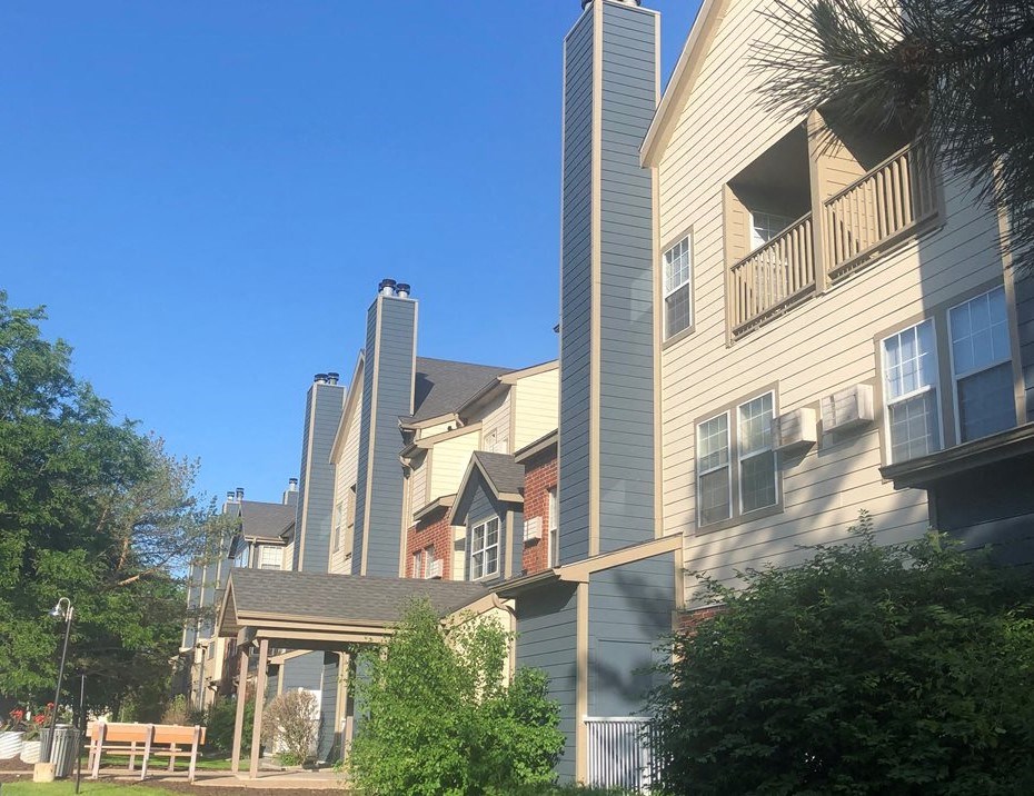 a row of houses on a city street
