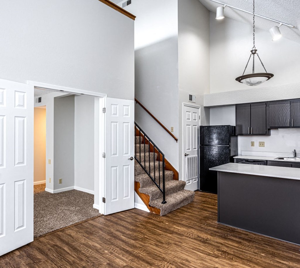 stairs next to a kitchen