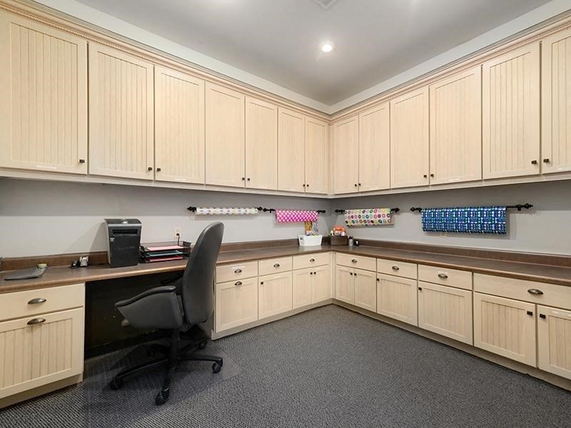 a office with a desk and a chair