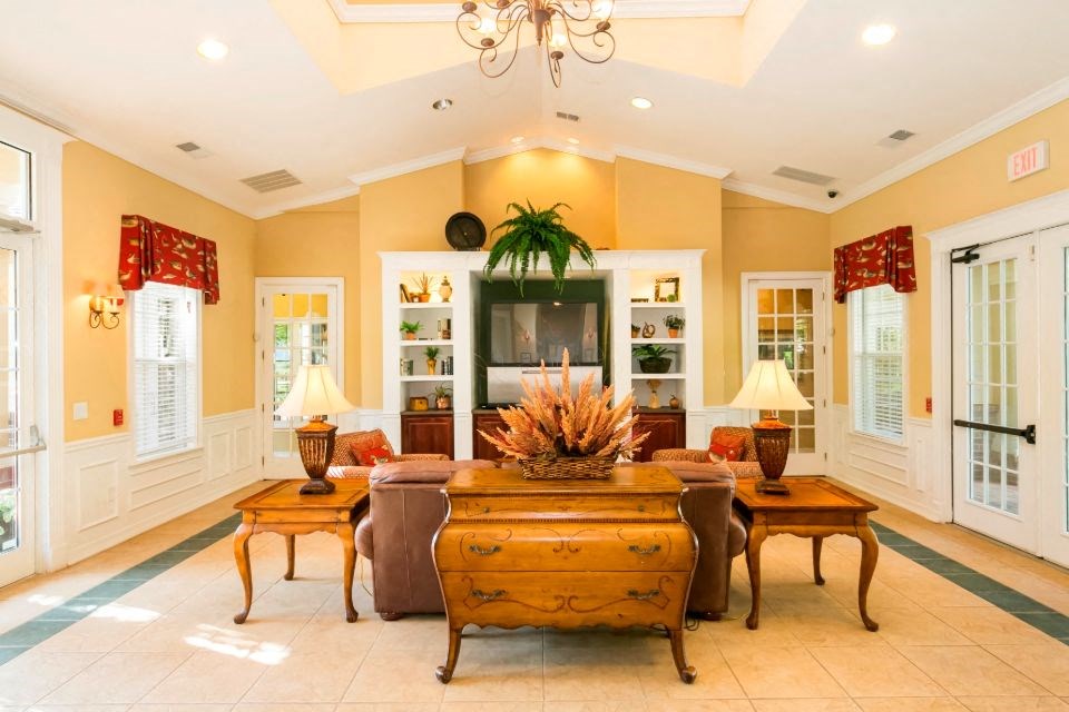 a living room with a couch and a table