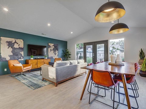 Open concept living and dining area at Creekview Apartments, Midvale, UT