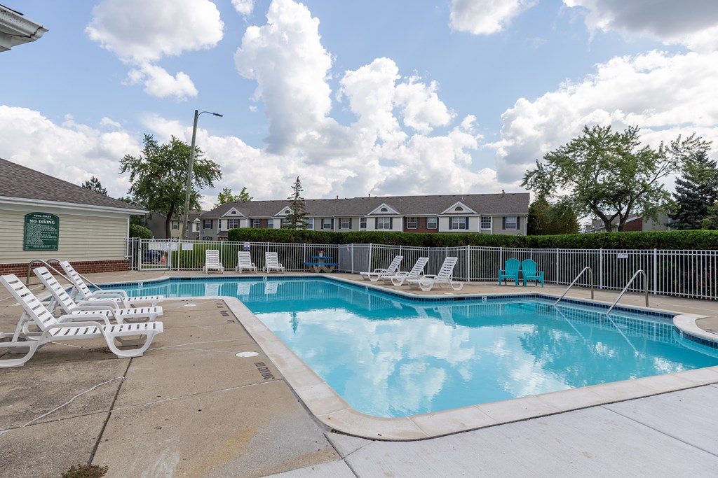 our apartments have a resort style pool with chaise lounge chairs