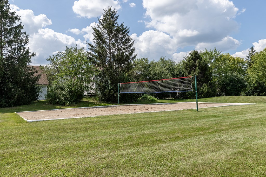 a soccer field with a net in the middle of a field
