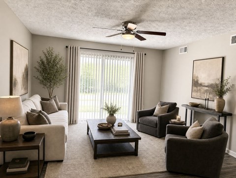 Modern living room with large windows at Tanyard Park Apartments, Louisville