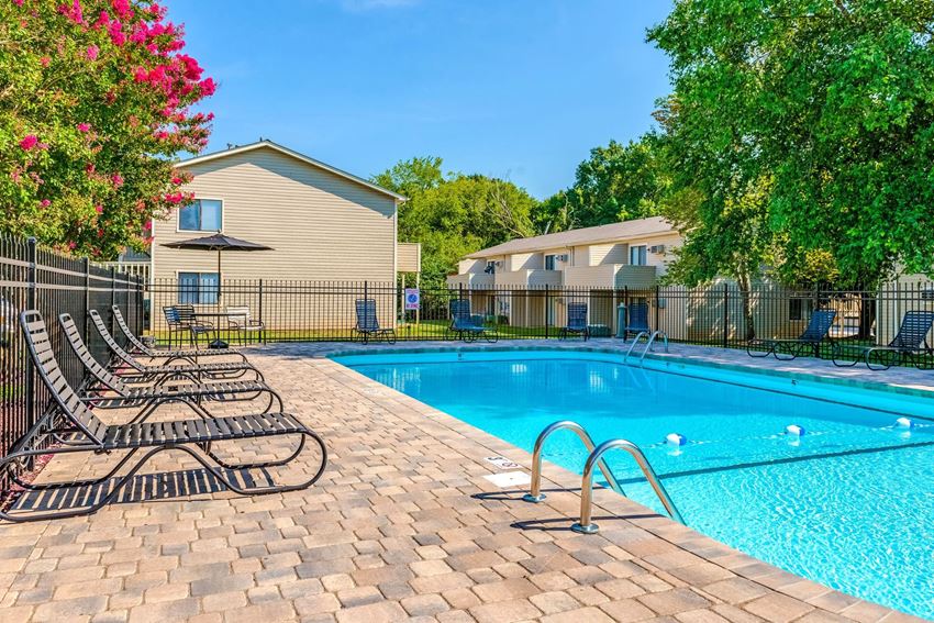 our apartments have a swimming pool with chairs