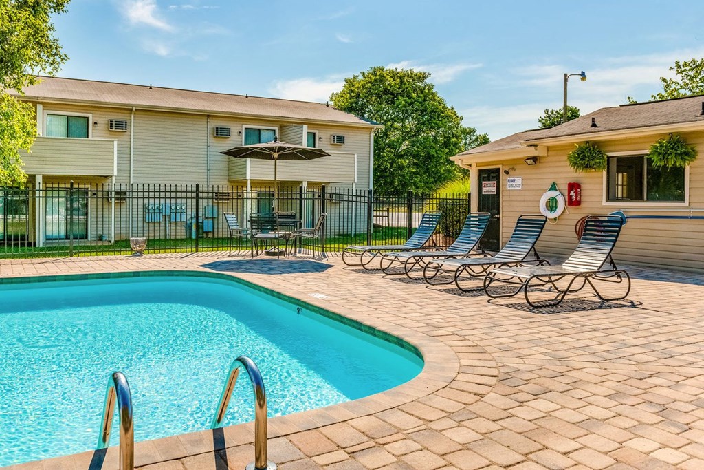 our apartments have a swimming pool with chaise lounge chairs