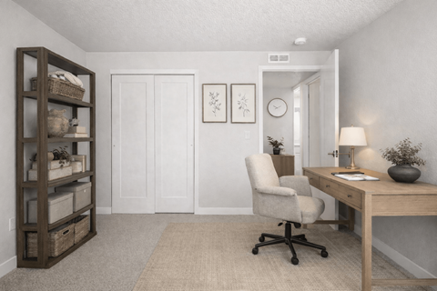 Home office with desk and shelving unit at Fort Lane Apartments, Layton, UT 84041