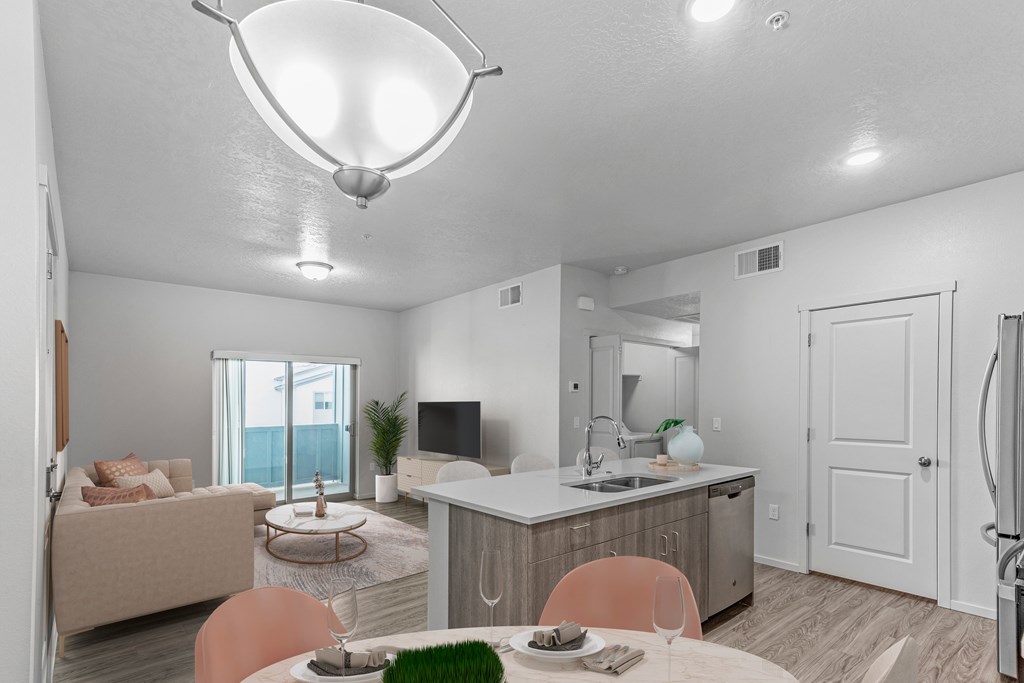 A well-lit kitchen and dining area with modern furniture. at Silver Ridge, Meridian, ID, 83642