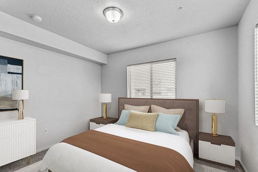 a bedroom with a bed and two night stands