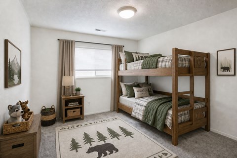 A cozy bedroom with a bunk bed and a bear rug on the floor.