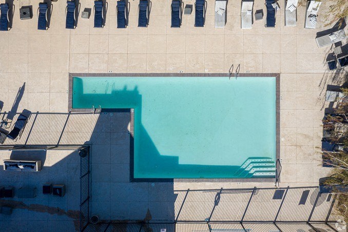 an aerial view of a swimming pool