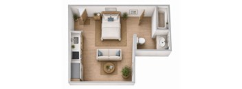 A top-down view of a small, neatly organized apartment with a bed, couch, and kitchen area.