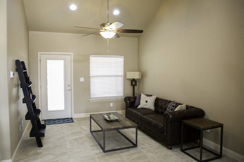a living room with a couch and a table