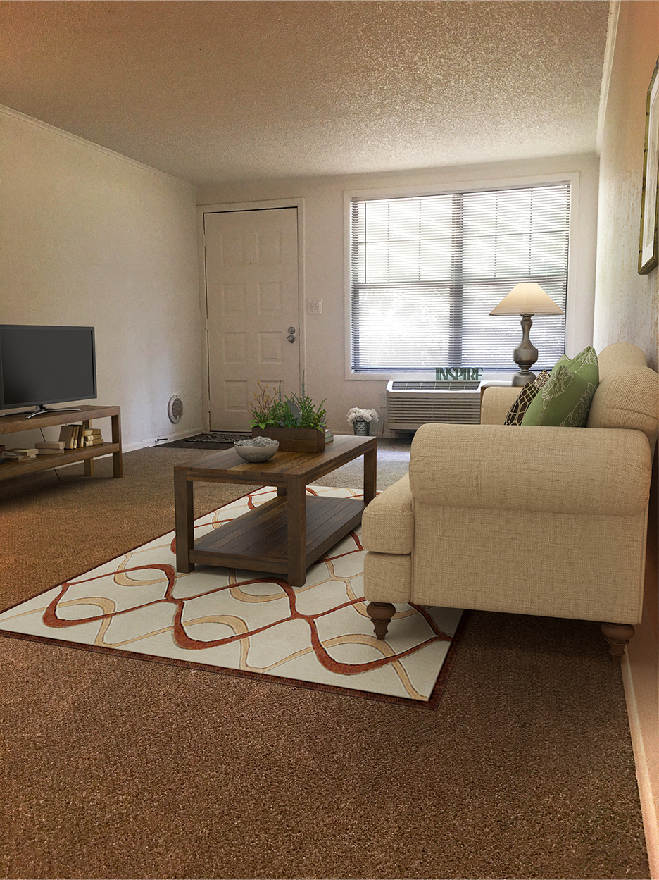 a living room with a couch and a coffee table