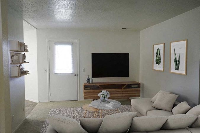 a living room with a couch and a television