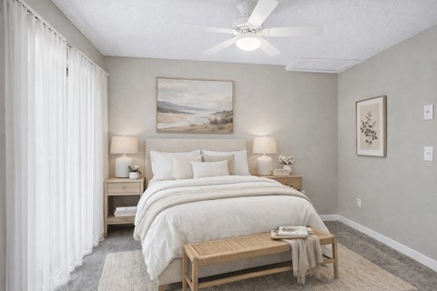 Neutral bedroom with ceiling fan and artwork at Davidson Homes Apartments, Concord
