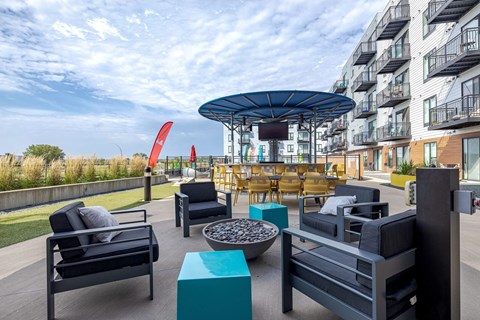 Rooftop terrace with firepit and outdoor seating at Hello Apartments, Minneapolis