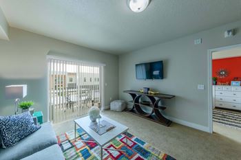 a living room with a couch and a table The Beckstead, South Jordan, UT, 84095