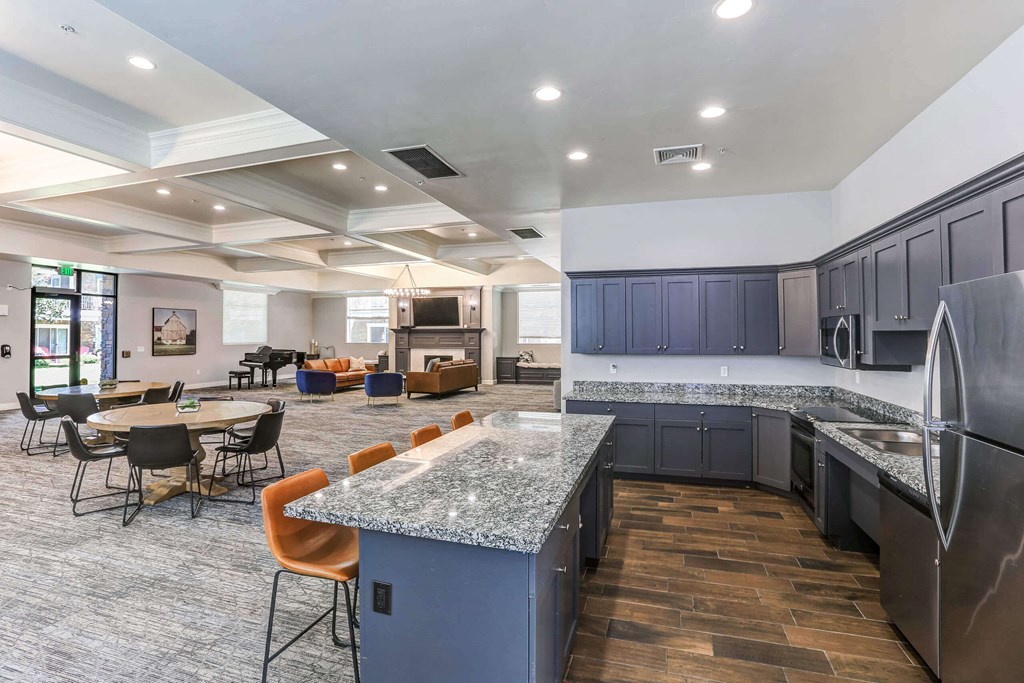 the reserve at bucklin hill clubhouse with granite countertops and stainless steel appliances at The Beckstead, South Jordan, Utah