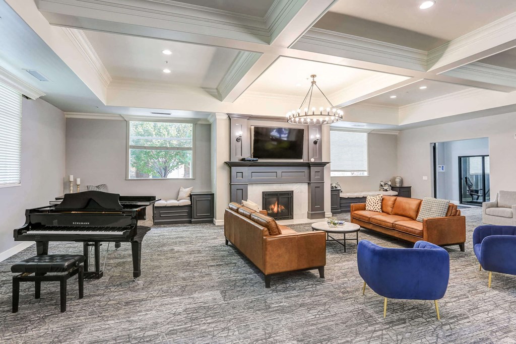 the heights club room with fireplace and piano at The Beckstead, South Jordan, UT