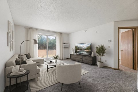 A modern living room with a grey carpet and a white sofa.
