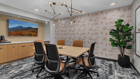 Modern conference room with wooden table at Grand Gateway Apartments, St Cloud, Minnesota