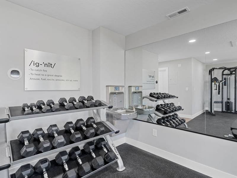 Free Weights In Gym at Lexington Park Apartments, West Valley City Utah