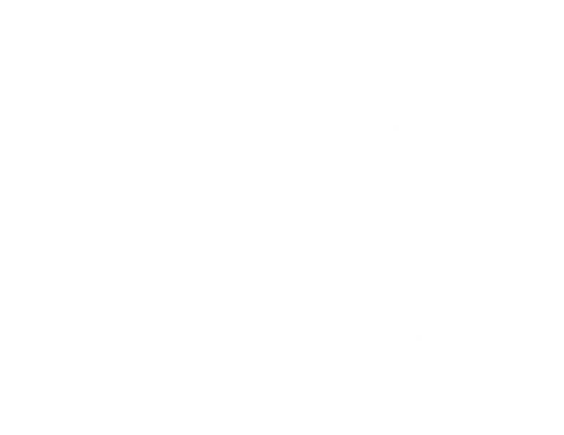 A black and white image with the words "ROYAL OAKS" written in bold white letters.