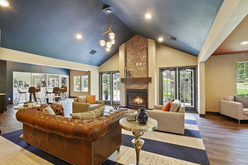 a living room with a couch and a fireplace
