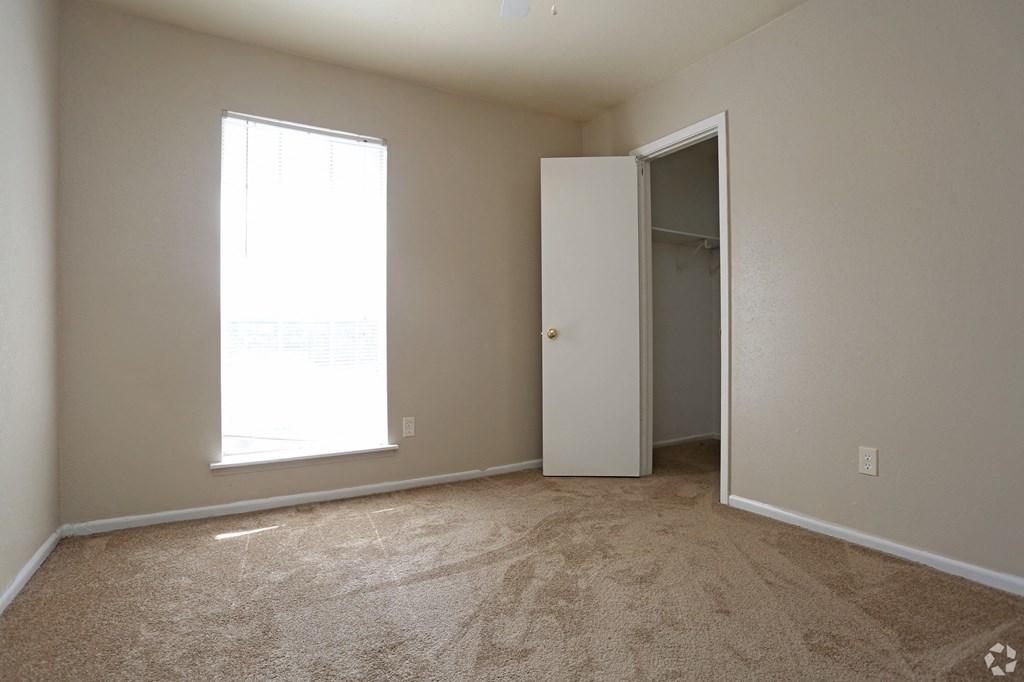 bedroom with window and closet at The Wilshire, Lake Charles, 70607