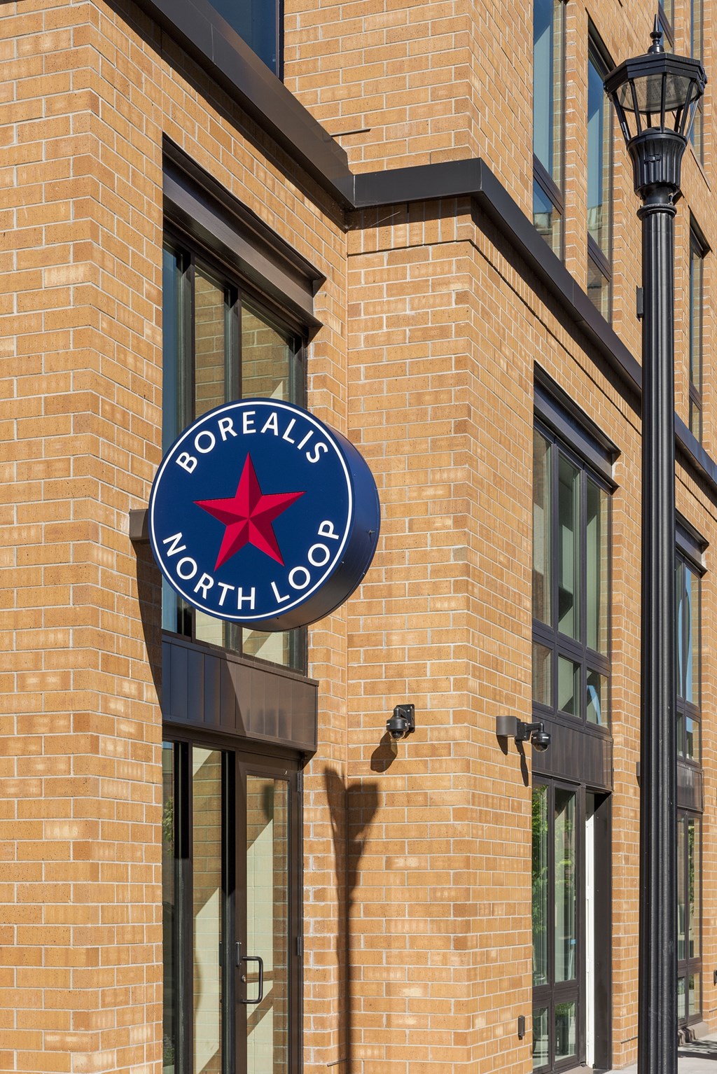 A sign on a building that says Borealis North Loo.