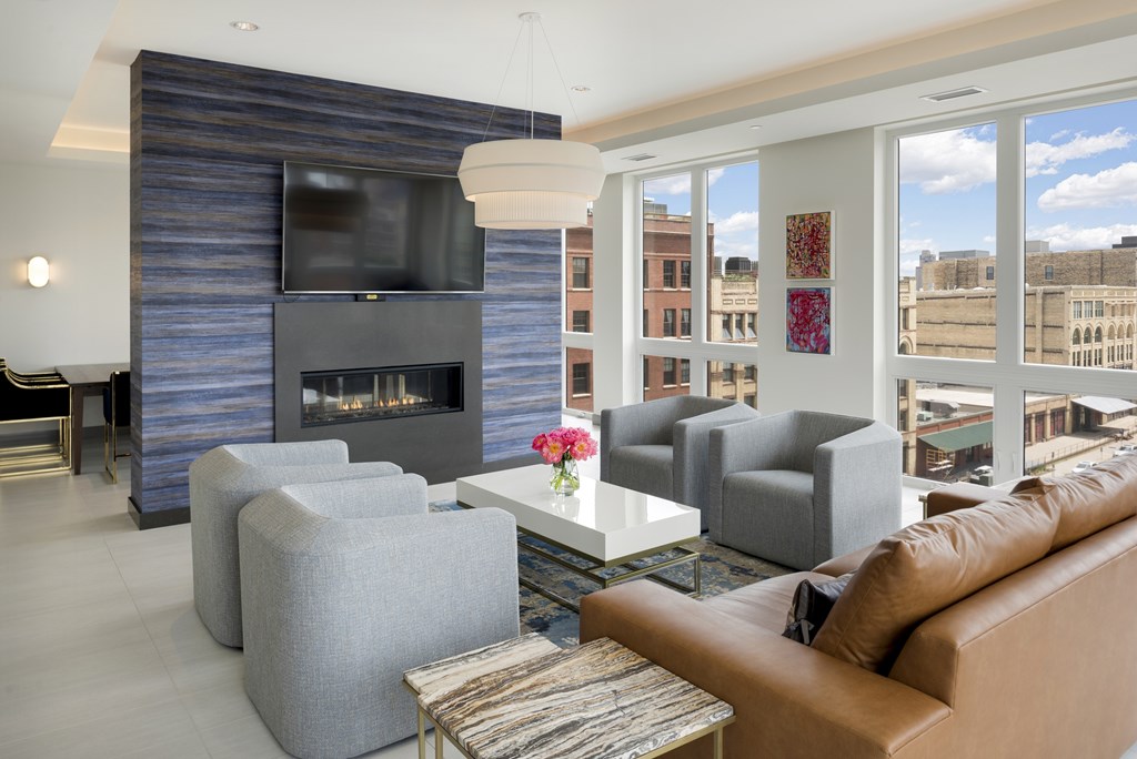 A living room with a fireplace and a couch.