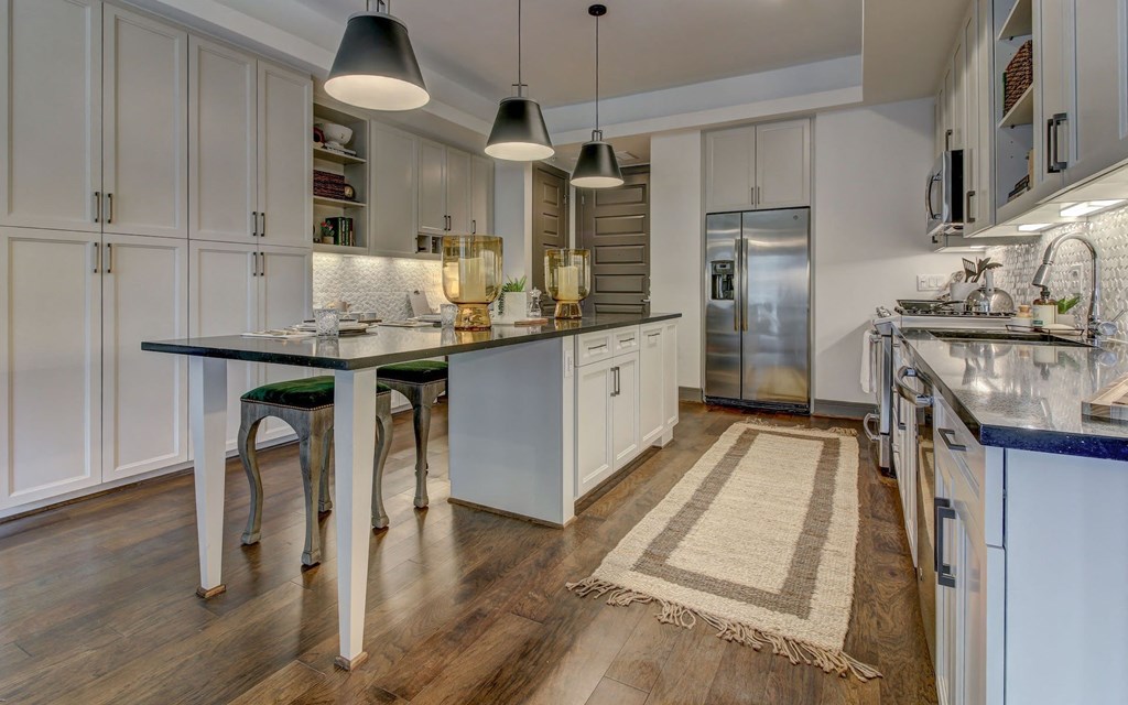 Designer Kitchen with Dine-In Gourmet Kitchen Islands and 48" Custom Cabinetry in Kitchens