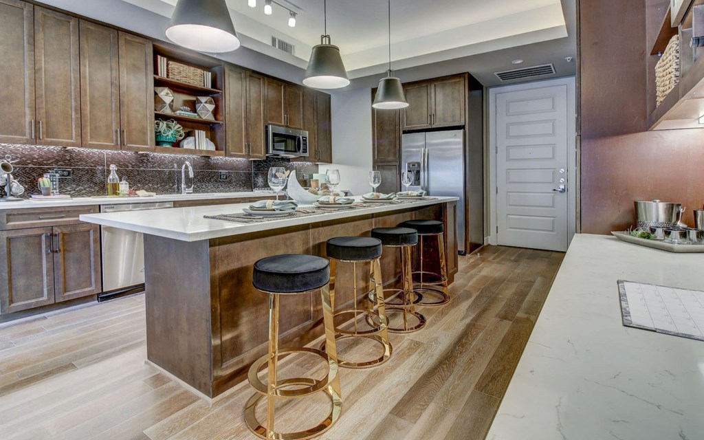 Custom Model Kitchen with Granite or Quartz Countertops and Designer Tile Backsplashes