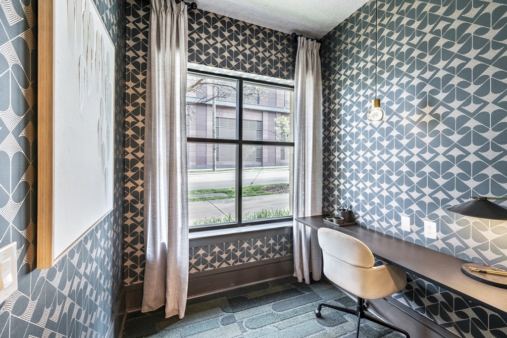 a small room with a desk and a window  at Park and Kingston, Charlotte